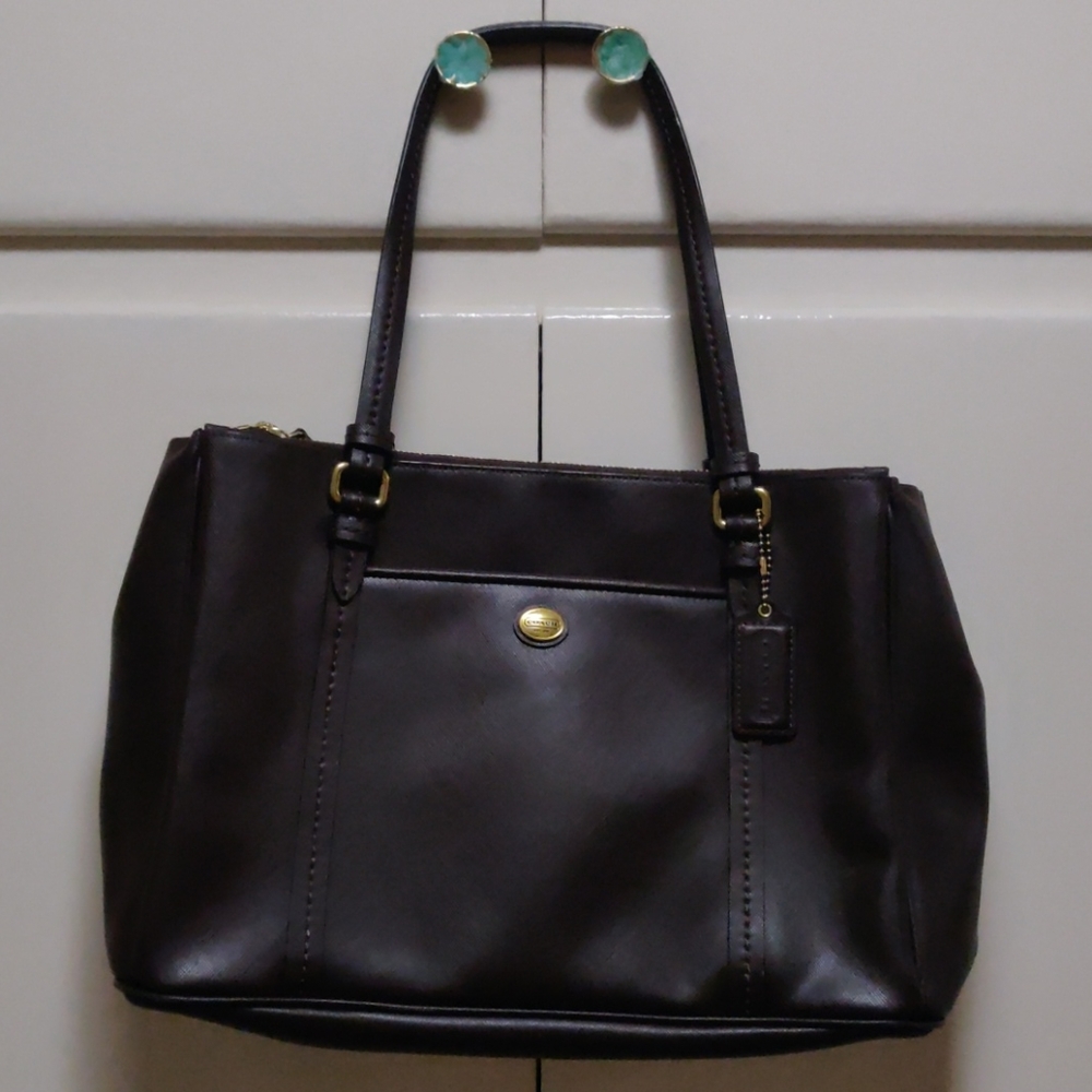 Coach dark maroon burgundy-ish color with gold